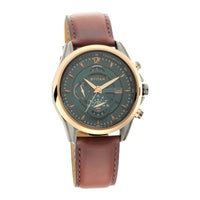 Modern Titan Maritime chronograph showing a green dial, gold bezel, & leather strap watch for men.