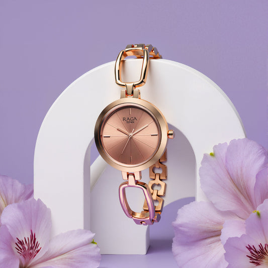 Titan Raga Quartz Analog Rose Gold Round Dial Rose Gold Metal Strap Watch For Women