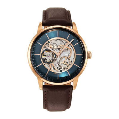 Elegant Titan automatic watch for men with green skeleton dial, rose goldcase & brown leather strap.