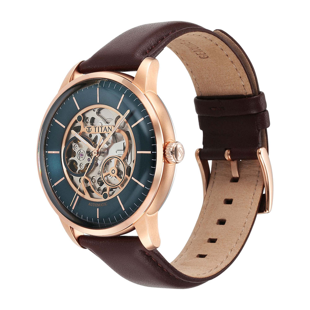 Angled view of Titan automatic watch for men with green dial, rose gold case & brown leather strap.